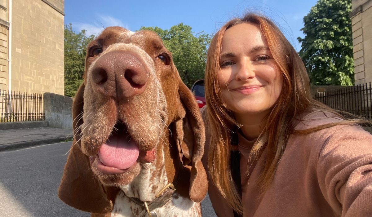 Doggy member Ernie with their borrower on a sunny day enjoying a walk around town