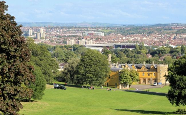 A view from the hill looking down on the open green space and Ashton Court Estate